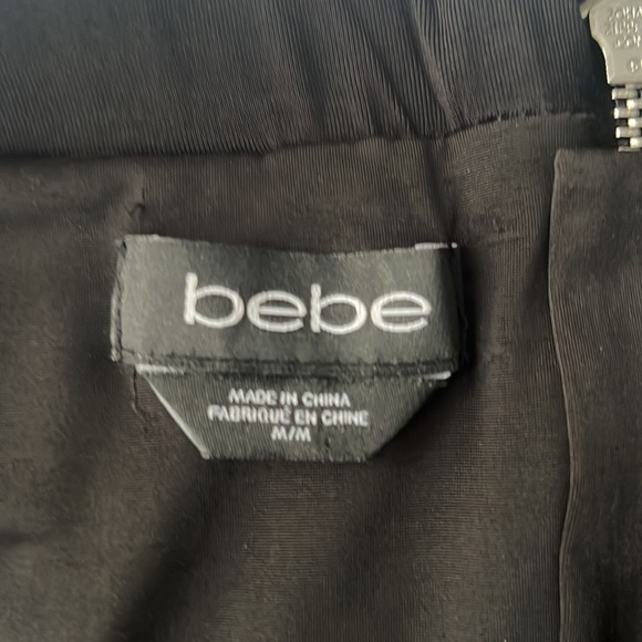 Bebe ruched black mini skirt with zip up back size medium - Picture 4 of 5